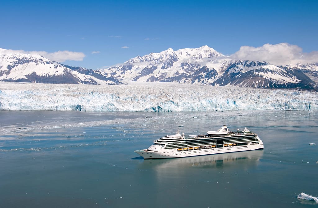 Serenade of the Seas cruise ship sails by Hubbard Glacier