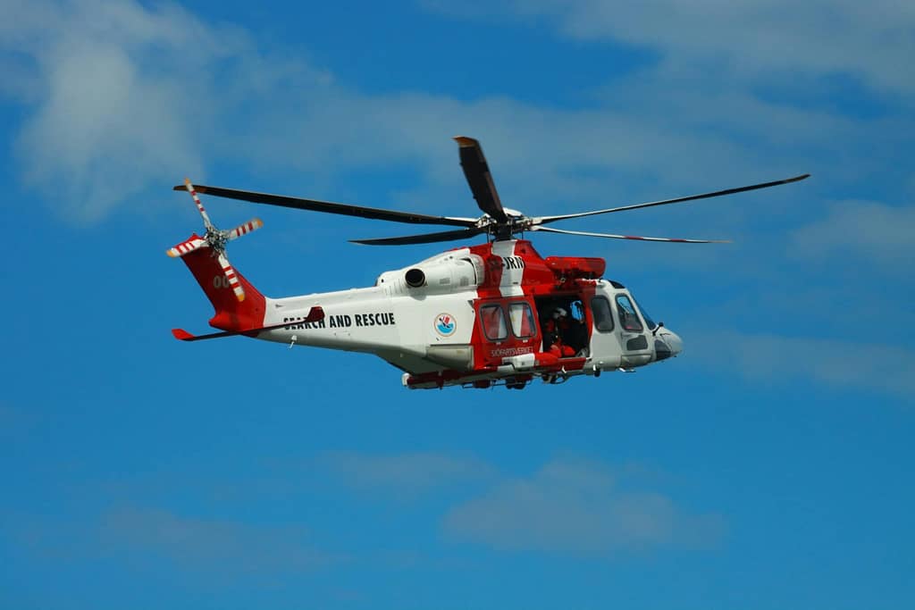 US Coast Guard Search and Rescue Helicopter in the Sky