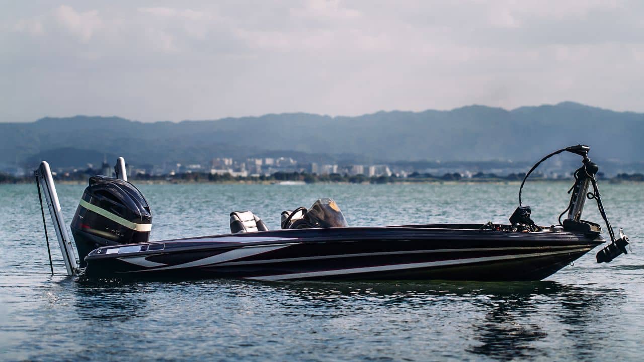 fishing boat floating in a bay