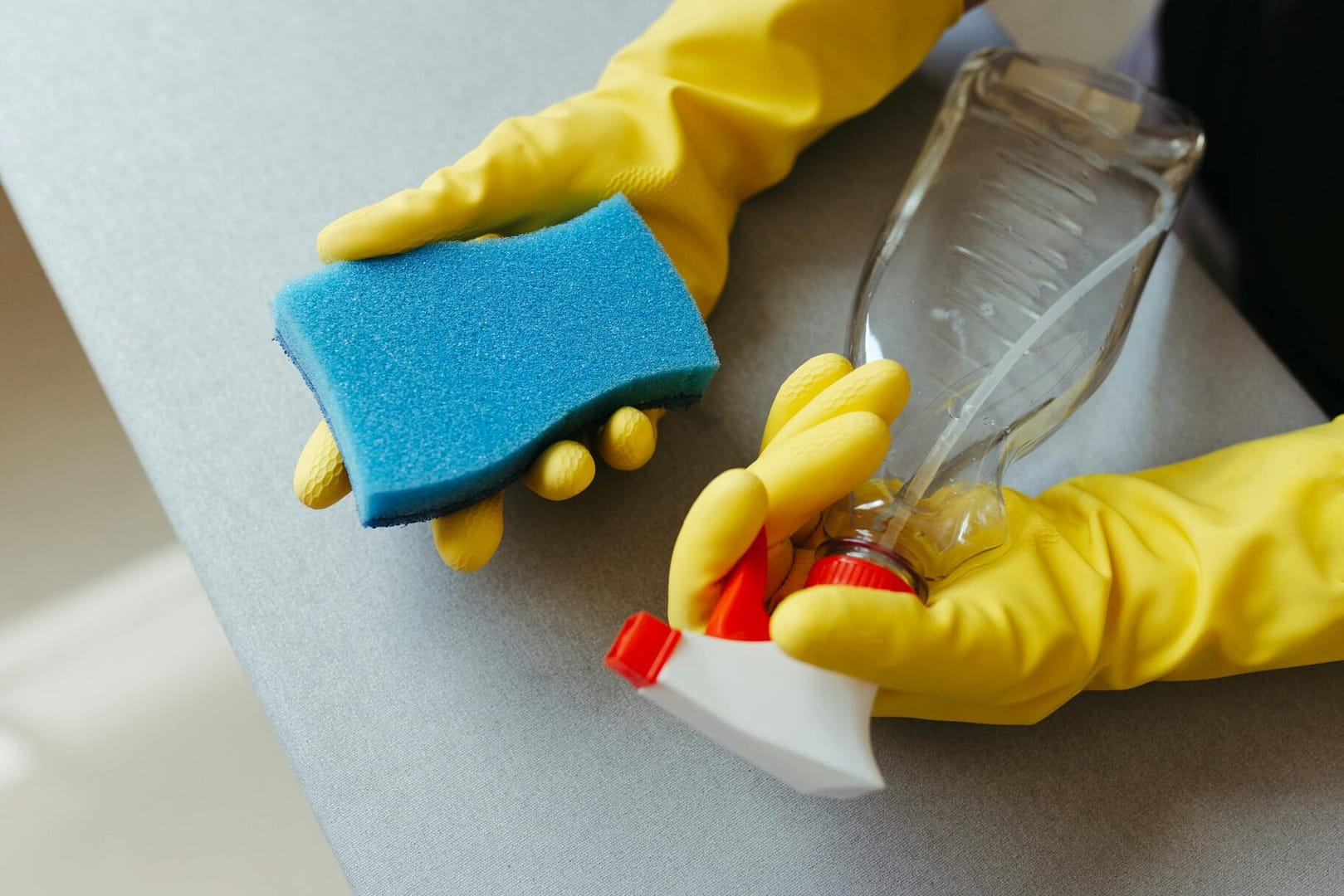 Hands Cleaning with Sponge and Spray Bottle