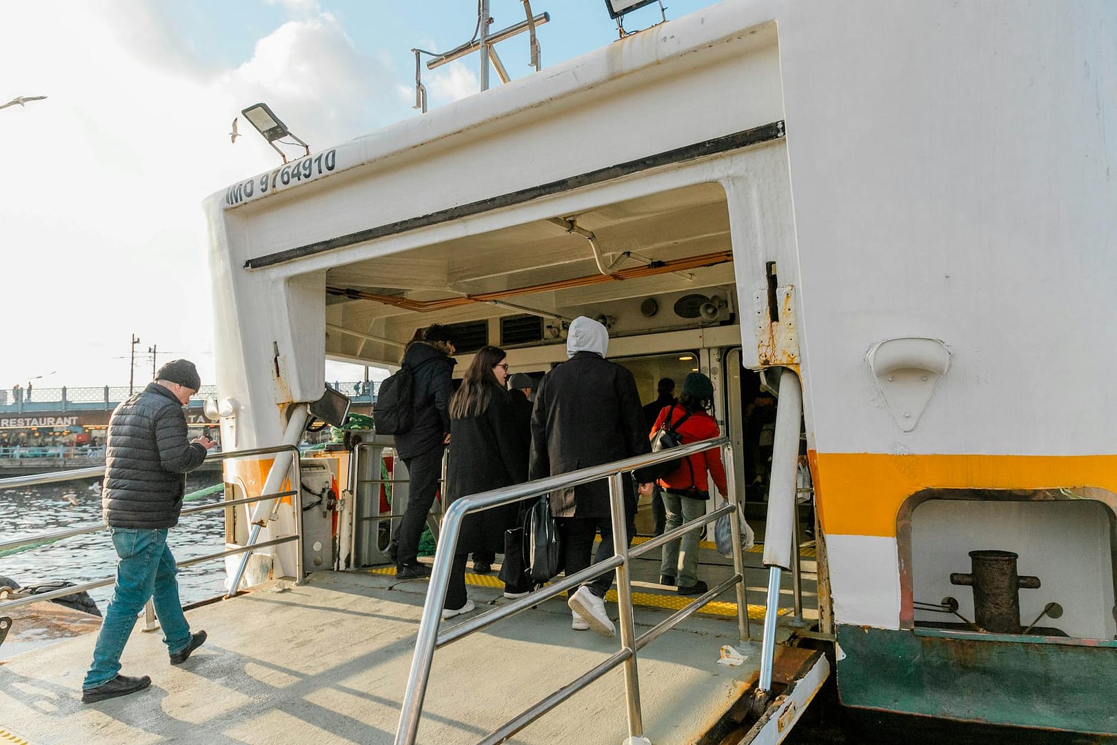 people boarding a ship