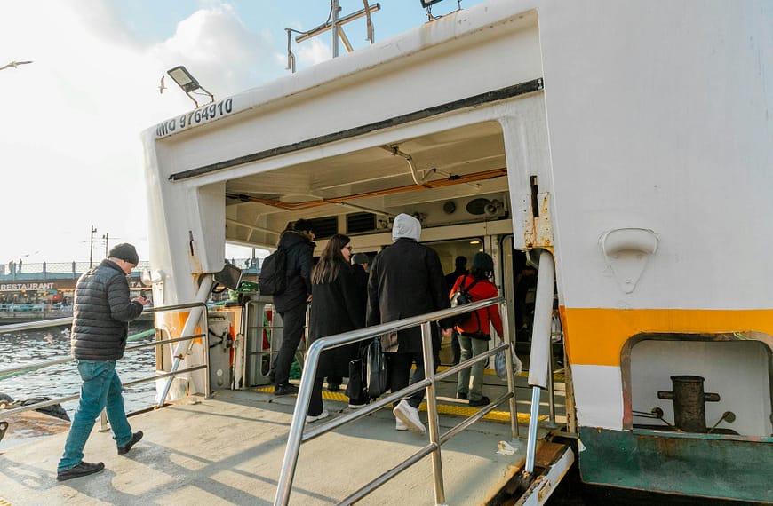 people boarding a ship