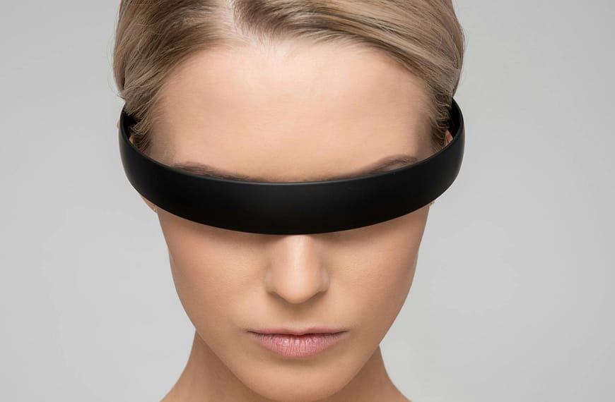 A captivating portrait of a woman with a sleek VR headset, depicting a futuristic theme.